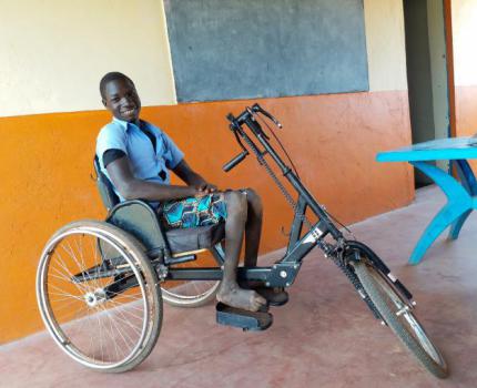 Dream to learn reignited: Moses goes to school, one hand-pedal at a time.